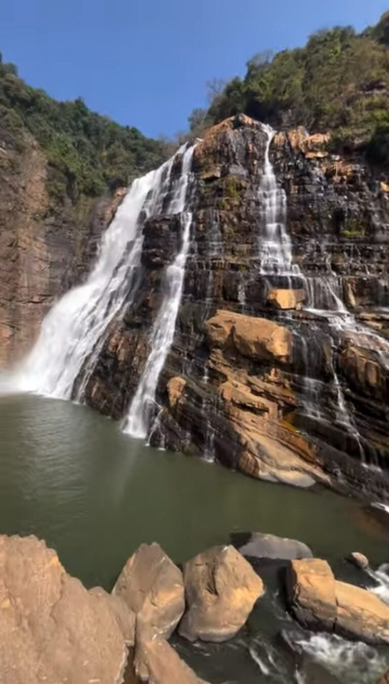 Closer view of Unchalli Falls showing strong water flow and rocky terrain