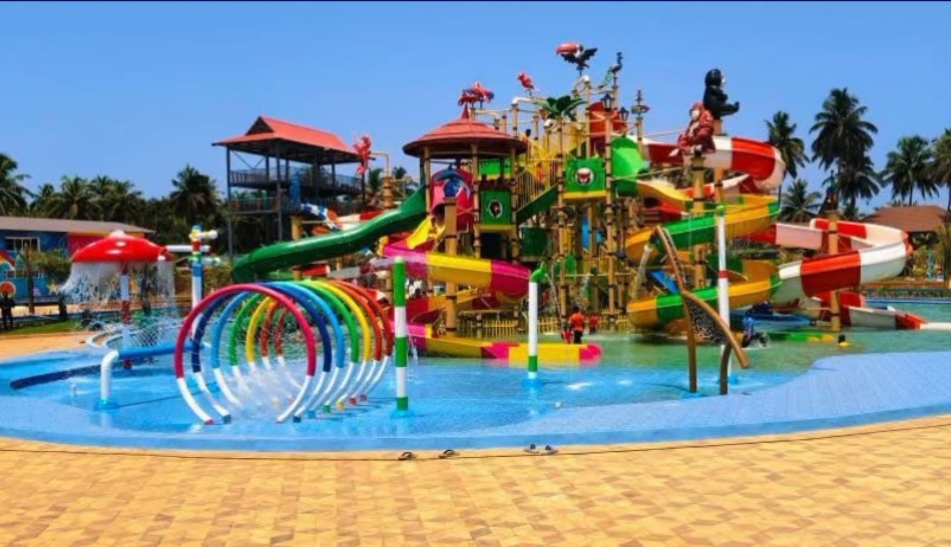 People enjoying the wave pool at JoynJoyy Water Park in Honnavar.